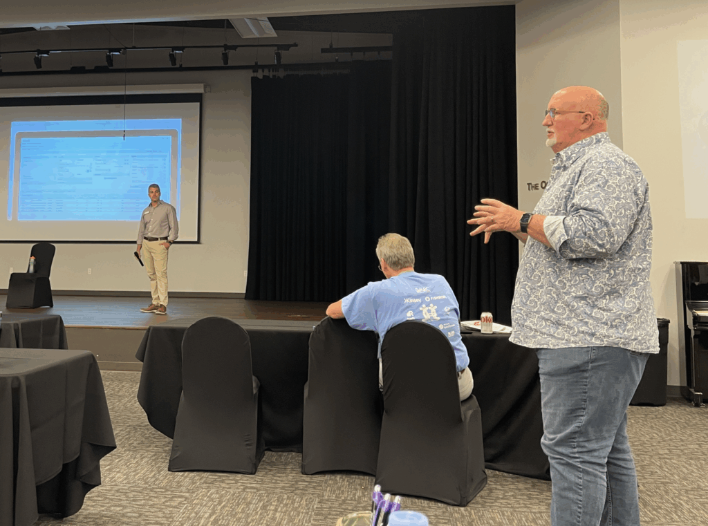 Dan Colby Speaking at an Event
